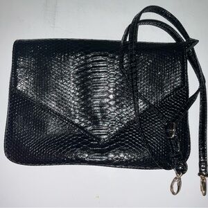 Urban Expressions, black snake print cross body purse.